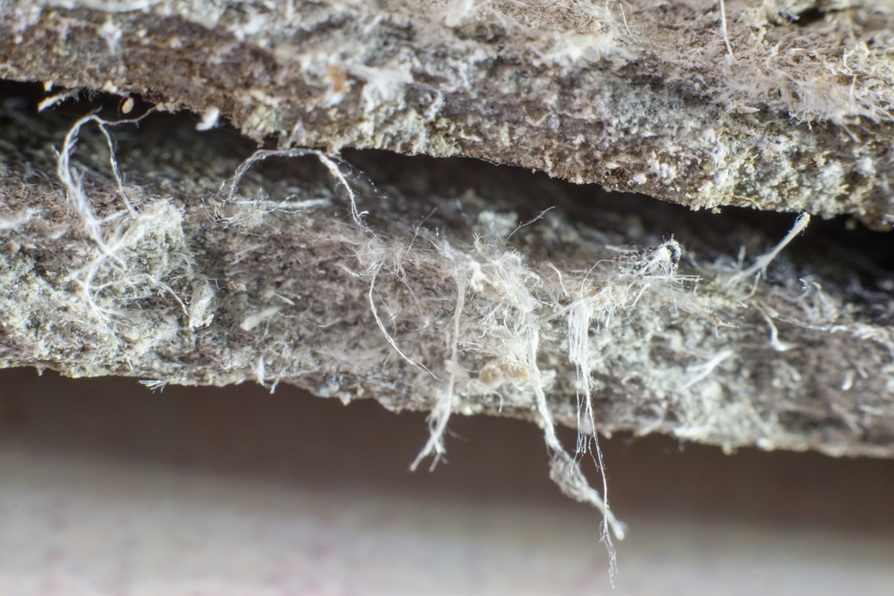 Detailed photography of roof covering material with asbestos fibres. Health harmful and hazards effects.